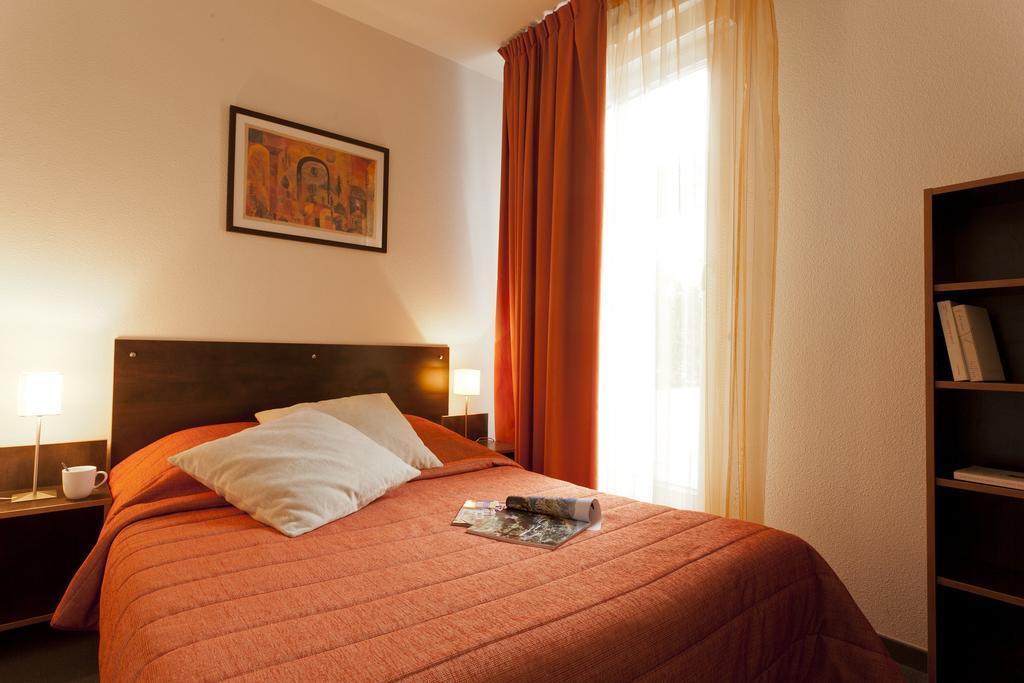 Apparthotel Privilodges Lyon Lumiere Lião Quarto foto